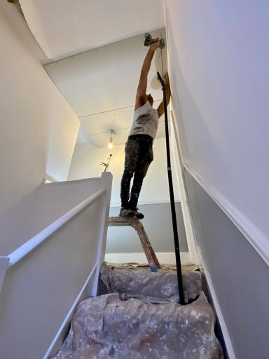 Boarding a landing and stairs ceiling